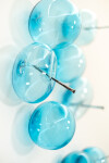 This contemporary wall sculpture features bubbles of blue glass. Image 6