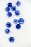 This contemporary lapis-colored glass wall sculpture was created by a Canadian artist. Image 5