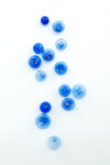 This contemporary cerulean colored glass wall sculpture was created by Cheryl Wilson Smith. Image 12