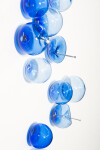 This contemporary cerulean colored glass wall sculpture was created by Cheryl Wilson Smith. Image 5