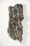 This contemporary wall sculpture is made of fired glass; its design is inspired by nature and rock formations. Image 10