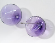 This contemporary, purple-colored, glass wall sculpture was created by Cheryl Wilson Smith. Image 12