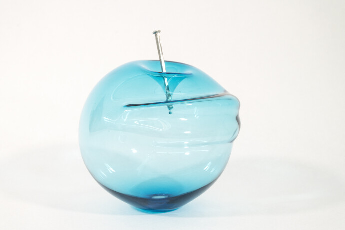 This contemporary blue glass tabletop sculpture is by Cheryl Wilson Smith.