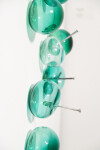 This contemporary wall sculpture features turquoise coloured glass bubbles. Image 9