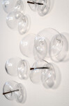 This contemporary clear glass wall sculpture was created by Cheryl Wilson Smith. Image 2