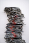 This contemporary glass wall sculpture resembles rock. Image 6