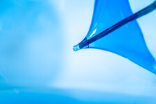 The contemporary blue glass tabletop sculpture is by Cheryl Wilson Smith. Image 10