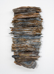 This contemporary glass wall sculpture by Cheryl Wilson Smith has an earthy colour palette.