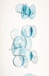 This contemporary wall sculpture features bubbles of blue glass. Image 8