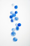 This contemporary cerulean colored glass wall sculpture was created by Cheryl Wilson Smith. Image 3