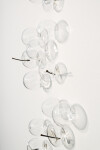 This contemporary wall sculpture features bubbles of clear glass. Image 10