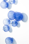 This contemporary wall sculpture features bubbles of lapis blue glass. Image 4