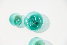 This contemporary wall sculpture features turquoise coloured glass bubbles. Image 4