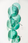 This contemporary wall sculpture features turquoise coloured glass bubbles. Image 8