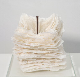This contemporary table top white glass sculpture is by Cheryl Wilson Smith.