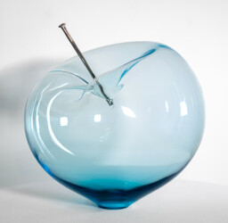This contemporary blue glass tabletop sculpture is by Cheryl Wilson Smith.