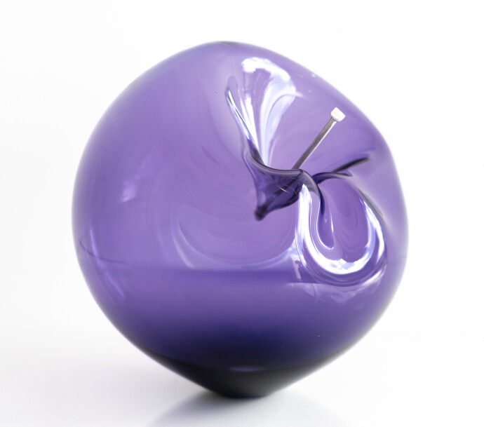 This contemporary purple glass tabletop sculpture is by Cheryl Wilson Smith.