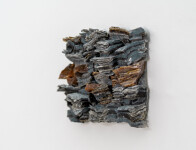 This contemporary wall sculpture is made of fired glass; its design is inspired by nature and rock formations. Image 4