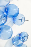 This contemporary cerulean colored glass wall sculpture was created by Cheryl Wilson Smith. Image 11