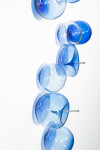This contemporary cerulean colored glass wall sculpture was created by Cheryl Wilson Smith. Image 5
