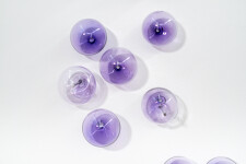 This contemporary, purple-colored, glass wall sculpture was created by Cheryl Wilson Smith. Image 6