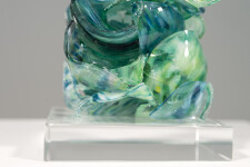 This contemporary turquoise glass sculpture is designed as a tabletop piece. Image 7