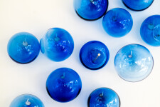 This contemporary glass wall sculpture features cerulean colored bubbles. Image 6