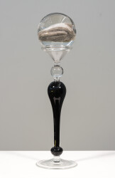 This contemporary table top, clear and black glass piece, is by Cheryl Wilson Smith.