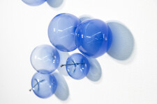 This contemporary wall sculpture features bubbles of lapis blue glass. Image 7