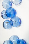 This contemporary cerulean colored glass wall sculpture was created by Cheryl Wilson Smith. Image 8
