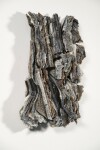 This contemporary wall sculpture is made of fired glass; its design is inspired by nature and rock formations. Image 9