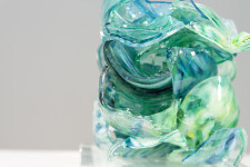 This contemporary turquoise glass sculpture is designed as a tabletop piece. Image 3