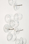 This contemporary clear glass wall sculpture was created by Cheryl Wilson Smith. Image 5