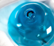 This contemporary wall sculpture features bubbles of blue glass. Image 10