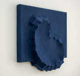 Sapphire blue felt takes the shape of a biomorphic form in this contemplative wall sculpture by fabric artist Chung-Im Kim. Image 3