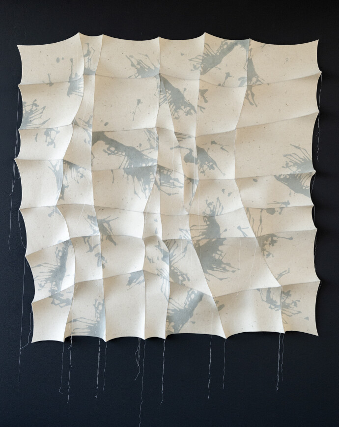 This contemporary white and blue-gray tapestry was hand-sewn by Canadian fabric artist Chung-Im Kim.