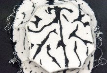 Off-white felt is delicately marbled with charcoal silkscreen lines in this playful relief by Chung-Im Kim. Image 3