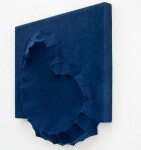 Sapphire blue felt takes the shape of a biomorphic form in this contemplative wall sculpture by fabric artist Chung-Im Kim. Image 4