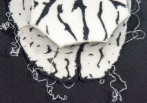 Off-white felt is delicately marbled with charcoal silkscreen lines in this playful relief by Chung-Im Kim. Image 4