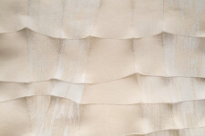 This contemporary white sculptural wall hanging was handmade. Image 7