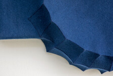 Sapphire blue felt takes the shape of a biomorphic form in this contemplative wall sculpture by fabric artist Chung-Im Kim. Image 6