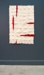 Striking organic shapes in bright red provide dramatic contrast in this cream-felt tapestry by fabric artist Chung-Im Kim. Image 11