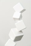 This contemporary indoor sculpture’s geometric steel form is coated in bright white. Image 4