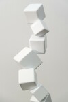 This contemporary indoor sculpture’s geometric steel form is coated in bright white. Image 9