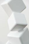 This contemporary indoor sculpture’s geometric steel form is coated in bright white. Image 12