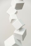 This contemporary indoor sculpture’s geometric steel form is coated in bright white. Image 5