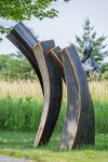 This striking blackened corten steel sculpture was created by Claude Millette. Image 2