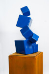 This contemporary indoor abstract sculpture has a geometric form made from steel. Image 3