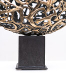 This contemporary table top sculpture is a mask forged from metal. Image 6
