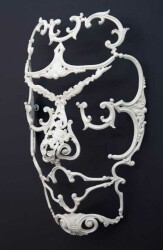 Bronze wall hanging mask.